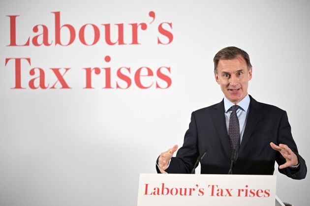 Jeremy Hunt delivers his speech accusing Labour of planning to put up taxes.