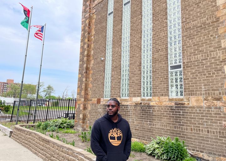 Dwayne Rushin, musician and activist, stands outside the King Solomon Baptist Church. He thinks many of the younger voters he meets in Detroit don't see Biden policies affecting them directly.
