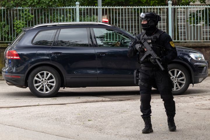 A car supposedly carrying the suspect, in shooting of Slovakia's Prime Minister Robert Fico, arrives at court in Pezinok, Slovakia, Saturday, May 18, 2024. (AP Photo/Tomas Benedikovic)