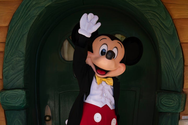 The cast members who dress up as Disney characters said they wanted higher pay, fairer scheduling and strong safety practices in the park.