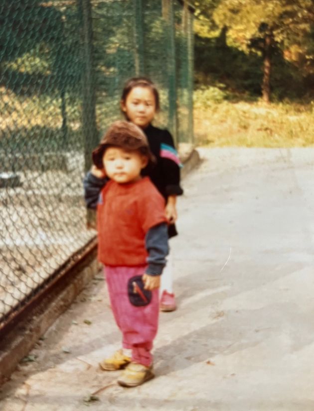 The author, rear, and her younger sister are shown in South Korea in the early 1980s.