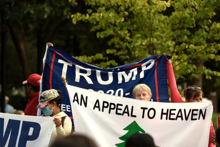 FILE - An Appeal To Heaven flag is pictured as people gather at Independence Mall to support President Donald Trump as he visits the National Constitution Center to participate in the ABC News town hall, Sept. 15, 2020, in Philadelphia. Supreme Court Justice Samuel Alito is embroiled in a second flag controversy, this time over the “Appeal to Heaven” flag, a banner that in recent years has come to symbolize Christian nationalism and the false claim that the 2020 presidential election was stolen. The flag was seen outside his New Jersey beach home last summer. (AP Photo/Michael Perez, File)