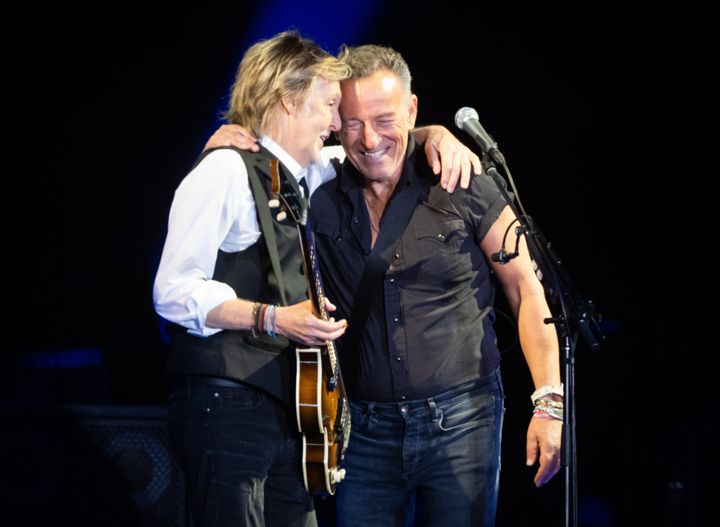 Paul McCartney, left, and Bruce Springsteen perform at England's Glastonbury Festival in June 2022.