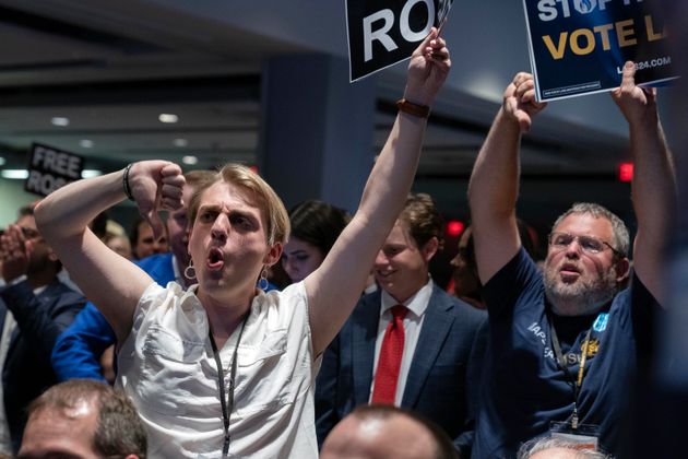 Libertarian delegates jeer Republican presidential candidate former President Donald Trump as he speaks at the Libertarian National Convention at the Washington Hilton in Washington, Saturday, May 25, 2024. (AP Photo/Jose Luis Magana)