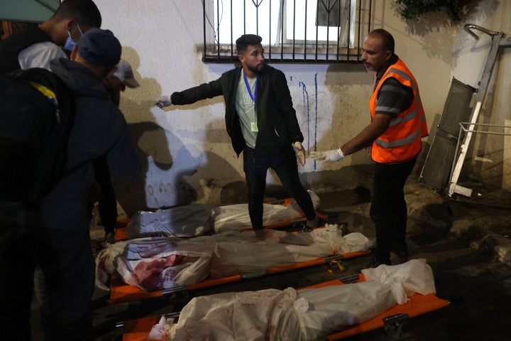 Medics prepare the bodies of Gazans killed in an Israeli strike on a camp in a so-called "safe zone" for displaced Palestinians at a hospital in Rafah on May 26, 2024.