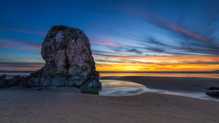 This is a photo taken at sunset at Pismo Beach, California.