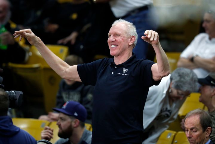 Television announcer Bill Walton acknowledges fans before covering the first half of an NCAA college basketball game as Colorado hosts Arizona, Jan. 6, 2018, in Boulder, Colorado.