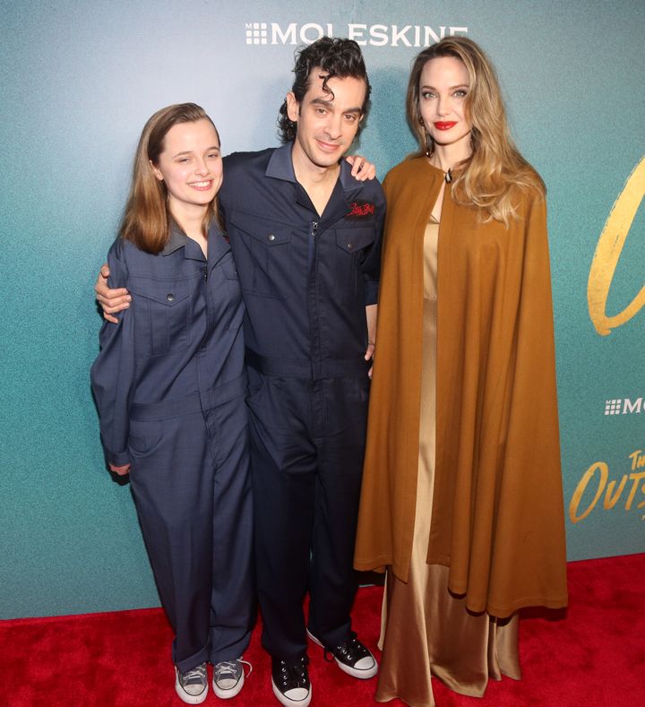 Vivienne and Angelina Jolie with musician Justin Levine at the opening night of The Outsiders on Broadway
