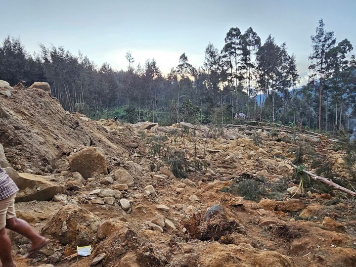 A view of the destroyed area after a massive landslide struck a village in Enga Province, Papua New Guinea on May 27, 2024. The site's remoteness, ongoing terrain movement and damage to access roads caused relief efforts to slow. (Photo by Emmanuel Eralia/Anadolu via Getty Images)