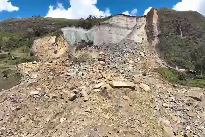 This frame grab from AFPTV video footage taken on May 27, 2024 shows the site of a landslide in Yambali village in the region of Maip Mulitaka, in Enga Province, Papua New Guinea. More than 2,000 people are feared buried in a Papua New Guinea landslide that destroyed a remote highland village, the government said on May 27, as it pleaded for international help in the rescue effort. (Photo by EMMANUEL ERALIA/AFPTV/AFP via Getty Images)