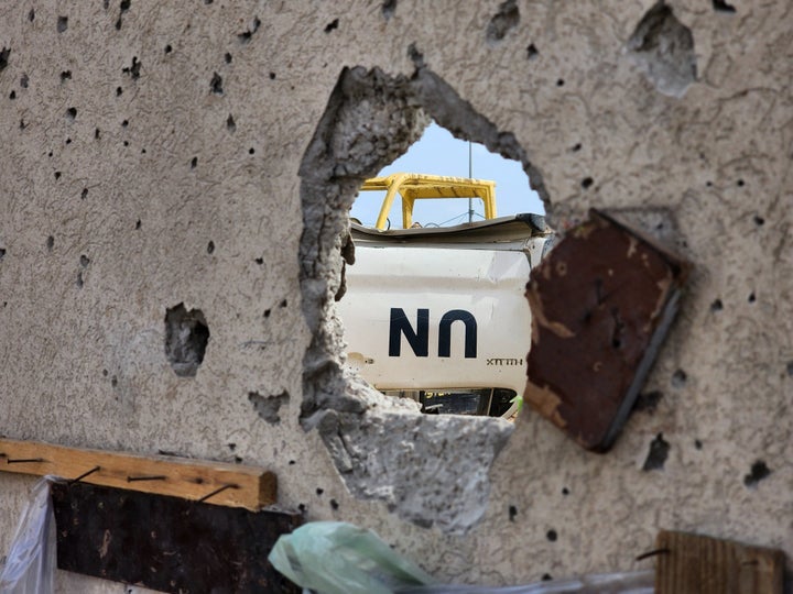 A hole in the wall of an UNRWA warehouse attacked by Israeli forces, who bombed a makeshift tent camp nearby for displaced Palestinians in Rafah, Gaza on May 28, 2024.