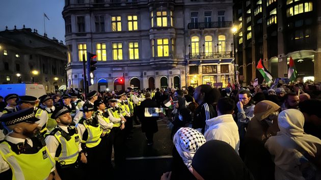 Thousands of people gather to hold pro-Palestinian demonstration and condemn Israeli attacks over Gaza at the entrance of Downing Street.