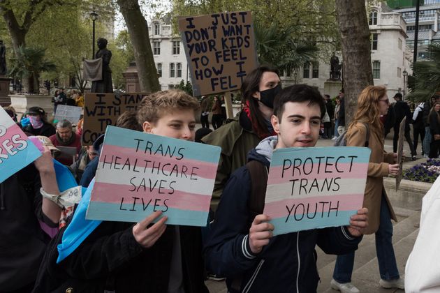 Transgender people and their supporters gather in Parliament Square to protest against a ban on puberty blockers in London, United Kingdom on April 20, 2024. 