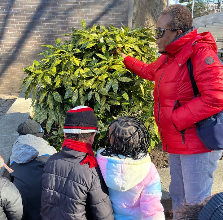 JoAnn Hawker is pictured with her gardening students.