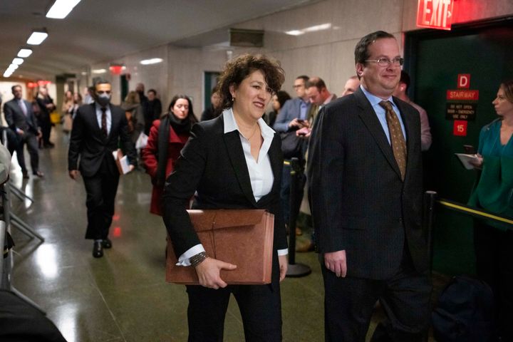 New York Executive Assistant District Attorney Susan Hoffinger, center, and Assistant District Attorney Joshua Steinglasst, arrive to a courtroom as the Trump Organization's former CFO, Allen Weisselberg, is due for sentencing on Jan. 10, 2023, in New York. 