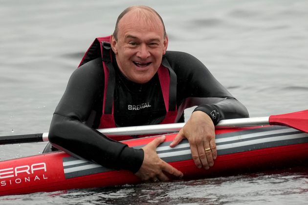 Liberal Democrats Leader Ed Davey kicked off his campaign with an accidentally-on-purpose fall into the water while paddle boarding on Lake Windermere.