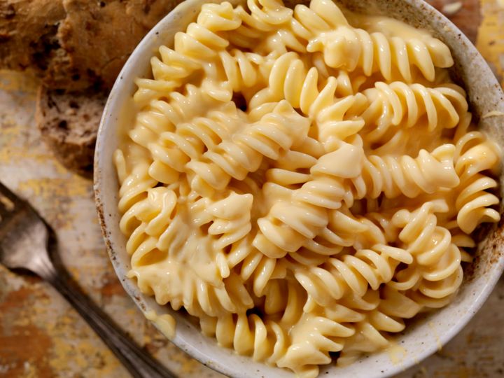Fusilli with cheese sauce.