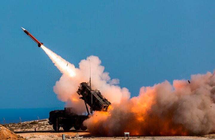 FILE - In this image released by the U.S. Department of Defense, German soldiers assigned to Surface Air and Missile Defense Wing 1, fire the Patriot weapons system at the NATO Missile Firing Installation, in Chania, Greece, on Nov. 8, 2017. U.S. officials say the Pentagon is expected to announce that it will provide about $6 billion in long-term military aid to Ukraine. It will include much sought after munitions for Patriot air defense systems and other weapons. (Sebastian Apel/U.S. Department of Defense, via AP, File)