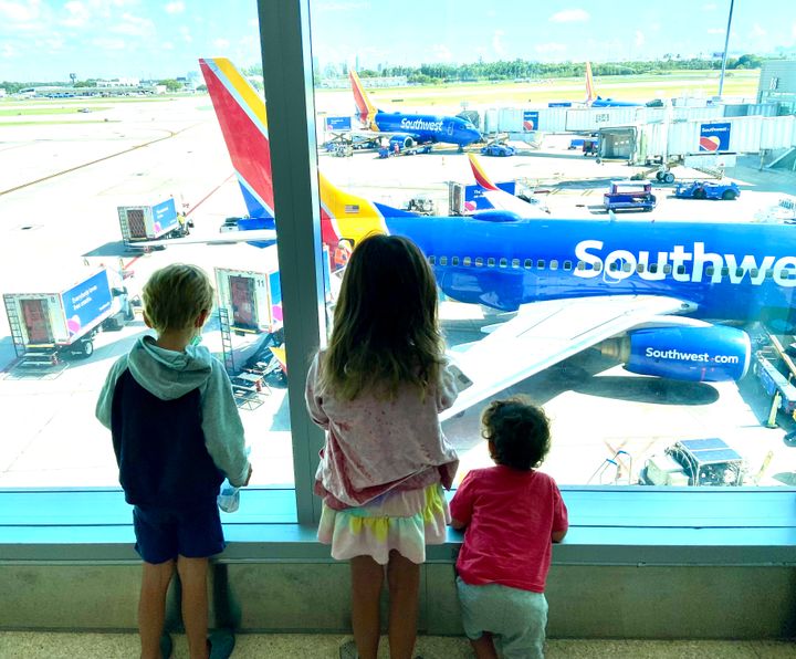 The author's children at the airport in 2022