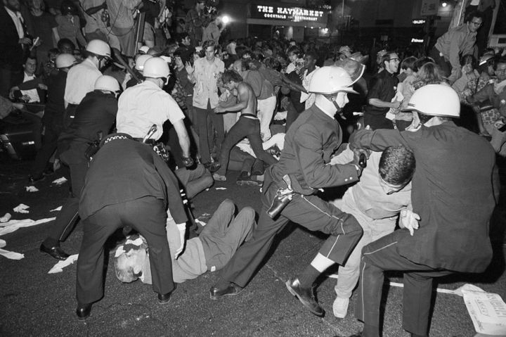 Police and demonstrators fight near the Conrad Hilton Hotel in Chicago during the Democratic National Convention on Aug. 28, 1968.