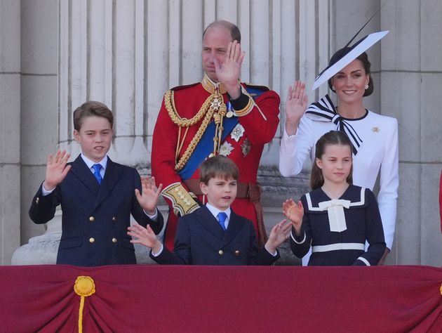 Prince George, the Prince of Wales, Prince Louis, the Princess of Wales and Princess Charlotte appear on the balcony at Buckingham Palace in London.