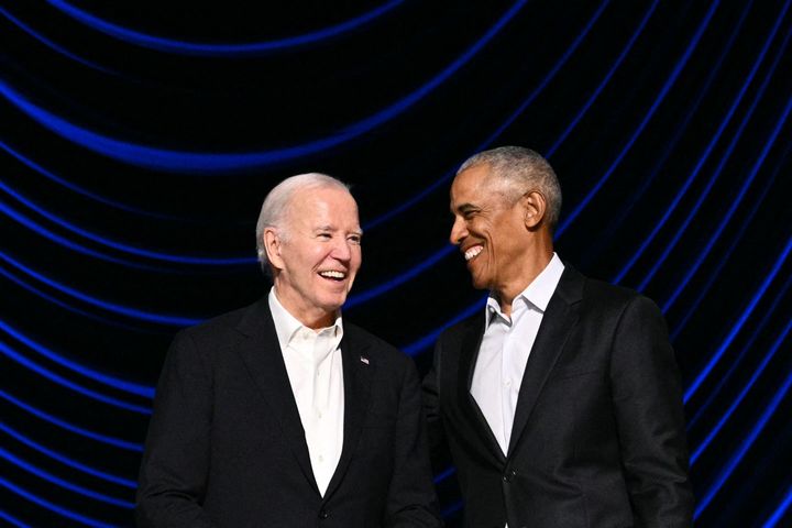 President Joe Biden laughs with former President Barack Obama during a campaign fundraiser in Los Angeles on Sunday. The event raised $30 million for the Democrat's reelection campaign in just one night.