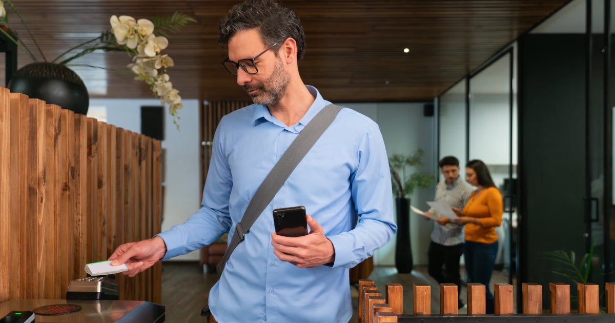 NextImg:In Defense Of 'Coffee Badging,' The Controversial New Office Trend
