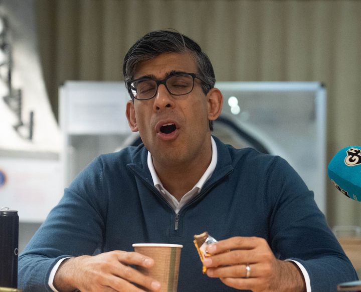 Prime Minister Rishi Sunak during a visit to Sizewell in Suffolk, speaking to journalists while enjoying a twix.