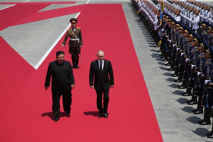 PYONGYANG, NORTH KOREA- JUNE 19 (RUSSIA OUT) Russia's President Vladimir Putin (R) and North Korean Supreme Leader Kim Jong Un (L) attend a welcoming ceremony before Russian-North Korean talks, June 19, 2024 in Pyongyang, North Korea. Russian President Vladimir Putin was in North Korea for a two-day diplomatic visit. (Photo by Contributor/Getty Images)