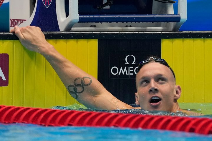 Caeleb Dressel reacts after the men's 100 butterfly semifinals heat Friday, June 21, 2024, at the US Swimming Olympic Trials in Indianapolis.