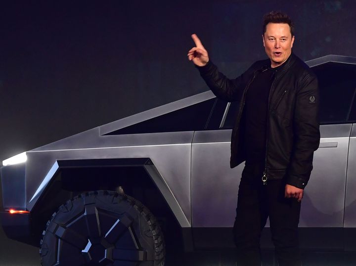 Elon Musk is pictured with the Tesla Cybertruck.