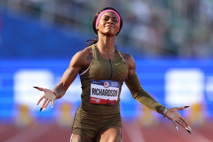 Sha'Carri Richardson crosses the finish line of the women's 100 meter dash semi-final on Day Two of the 2024 U.S. Olympic Team Track & Field Trials at Hayward Field on June 22, 2024 in Eugene, Oregon.