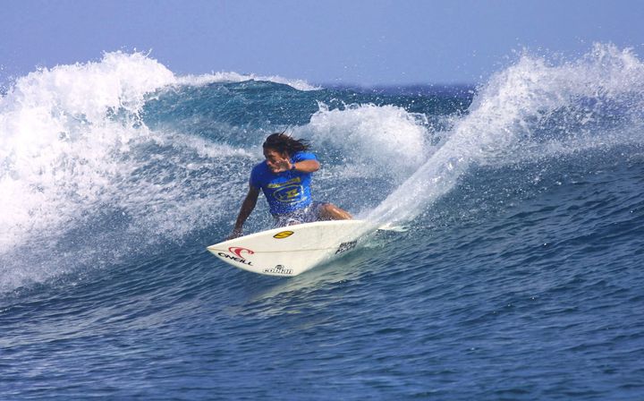 Tamayo Perry competes in the Billabong Pro trials in 2003 off Teahupoo, Tahiti.