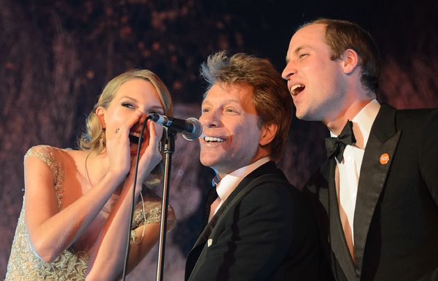Taylor Swift and Prince William on stage with Jon Bon Jovi at a Centrepoint event in 2013