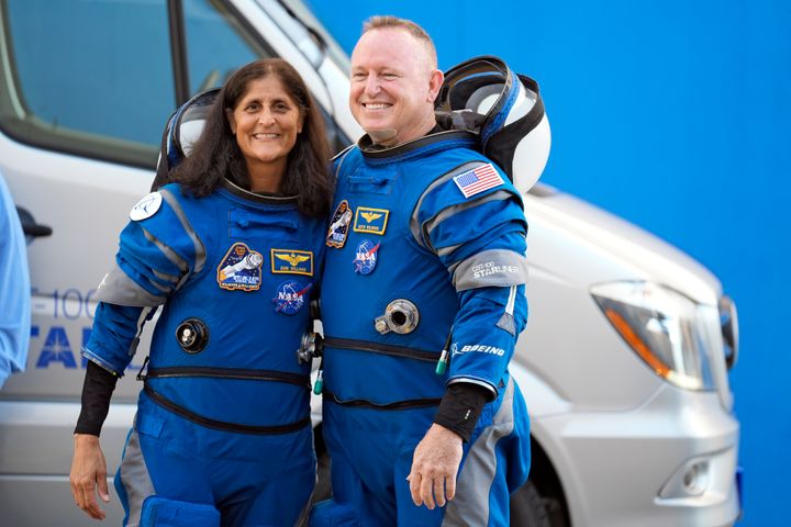 NASA astronauts Suni Williams, left, and Butch Wilmore pose for a photo after leaving the operations and checkout building for a trip to the launch pad on June 5, 2024, in Cape Canaveral, Fla.