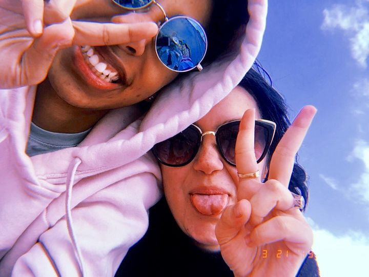 Taryn (left) and the author (right) hanging out at the beach five days before they started dating.