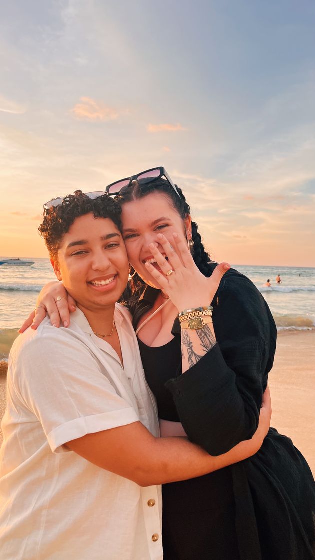 Taryn (left) and author (right) moments after getting engaged on a beach in Phuket at sunset.