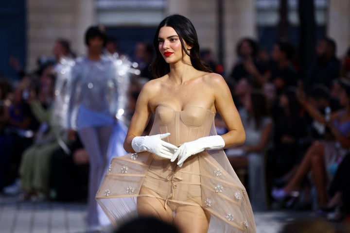 Kendall Jenner walks during the Vogue World fashion show at Paris' Place Vendôme on June 23, 2024. During her trip to France, she got to explore the famed Louvre museum while barefoot.