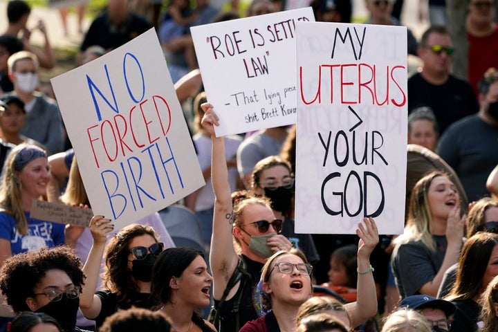 Abortion-rights protesters cheer at a rally on June 24, 2022, in Des Moines, Iowa.