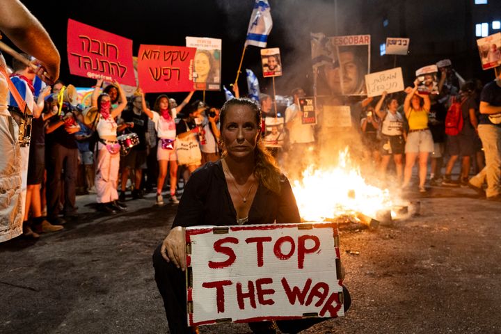 Families of hostages and supporters set a fire during a demonstration calling for a hostages deal and against the Israeli Prime Minister Benjamin Netanyahu on June 29, 2024 in Tel Aviv, Israel. 