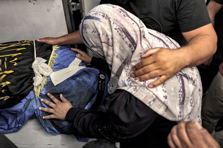 Relatives of 24-year-old Saeed Izzat Jaber, a Palestinian militant who was killed by an Israeli airstrike on the Nur Shams camp, mourn at the Tulkarm Governmental Hospital's morgue in Tulkarm in the occupied West Bank, on June 30, 2024.