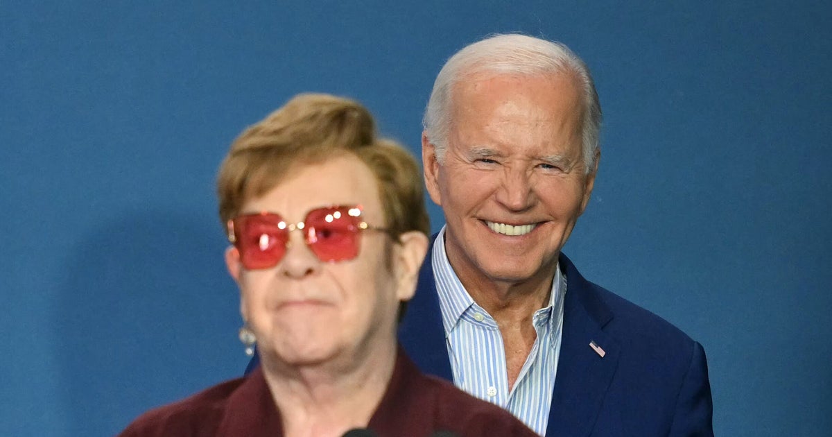Joe Biden Reacts To Elton John's Onstage F-Bomb With A Simple Hand Gesture