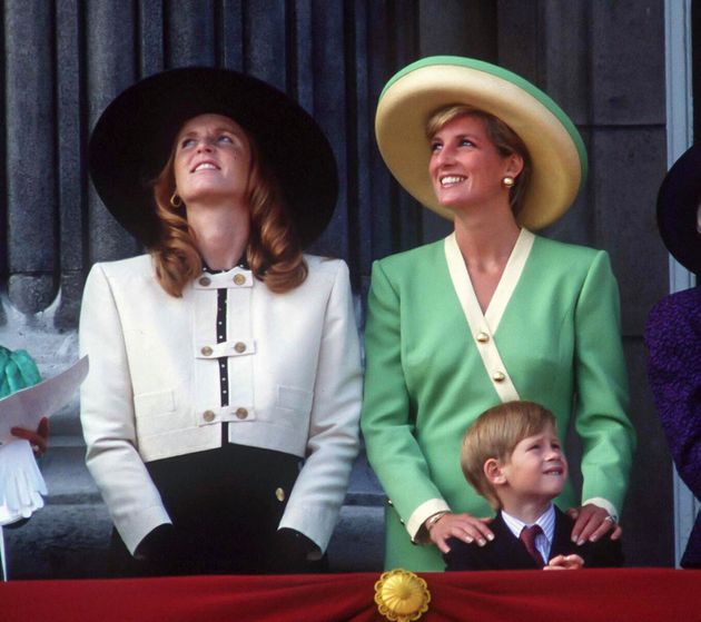 The Princess of Wales, Duchess of York and Prince Harry attend the 50th anniversary of the Battle of Britain Parade on the balcony of Buckingham Palace on Sep. 15, 1990, in London.