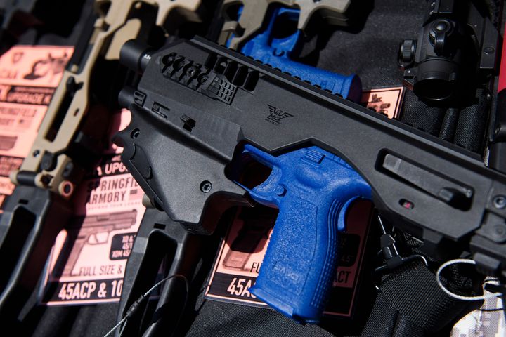 A pistol brace for a handgun is displayed with firearm accessories for sale at the Crossroads of the West Gun Show at the Orange County Fairgrounds on June 5, 2021, in Costa Mesa, California.