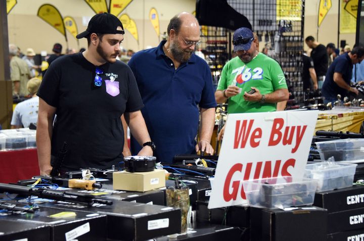 Gun enthusiasts attend the South Florida Gun Show at Dade County Youth Fairgrounds in Miami on Feb. 17, 2018.