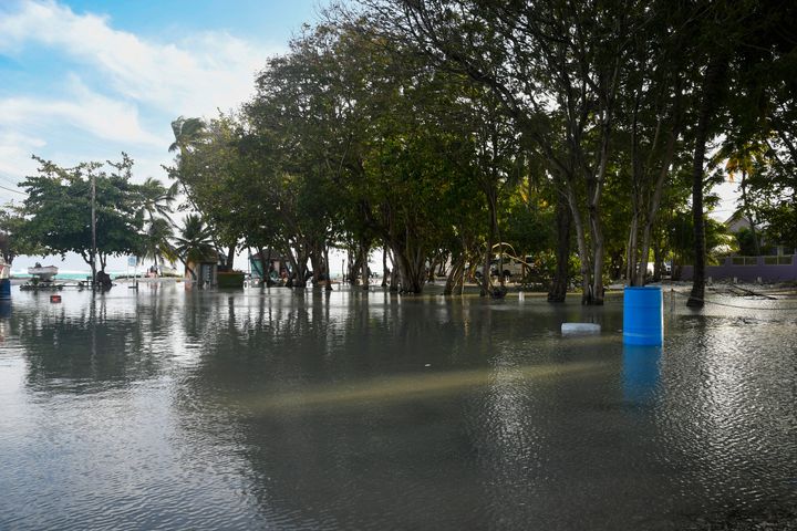 A flooded parking lot is seen after the passing of Hurricane Beryl in Worthing, Christ Church, Barbados on July 1, 2024. 