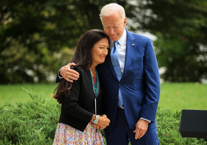 President Joe Biden is proud of his record of lifting up Native American communities and people. Here, he embraces Secretary of the Interior Deb Haaland, his historic pick for the job.