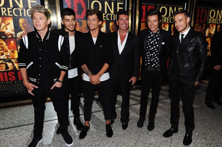 Simon Cowell with One Direction in 2013