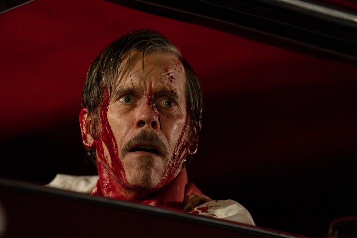 In "MaXXXine," Kevin Bacon plays a campy, sleazy private detective — and stars in one of the film's goriest scenes.