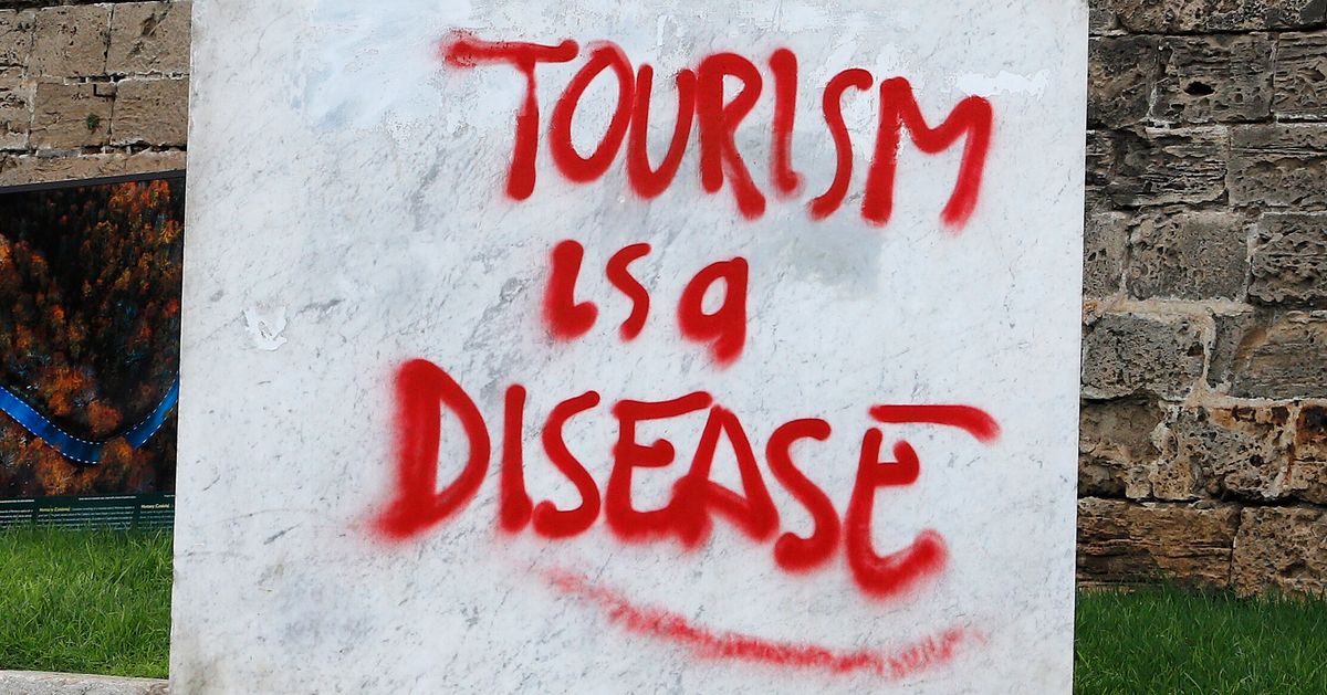 'It's Tourist Hunting Season': The Street Art That's Seething About Mass Tourism